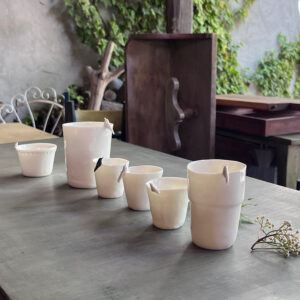 Tazzine e ciotole con uccellino o fiori